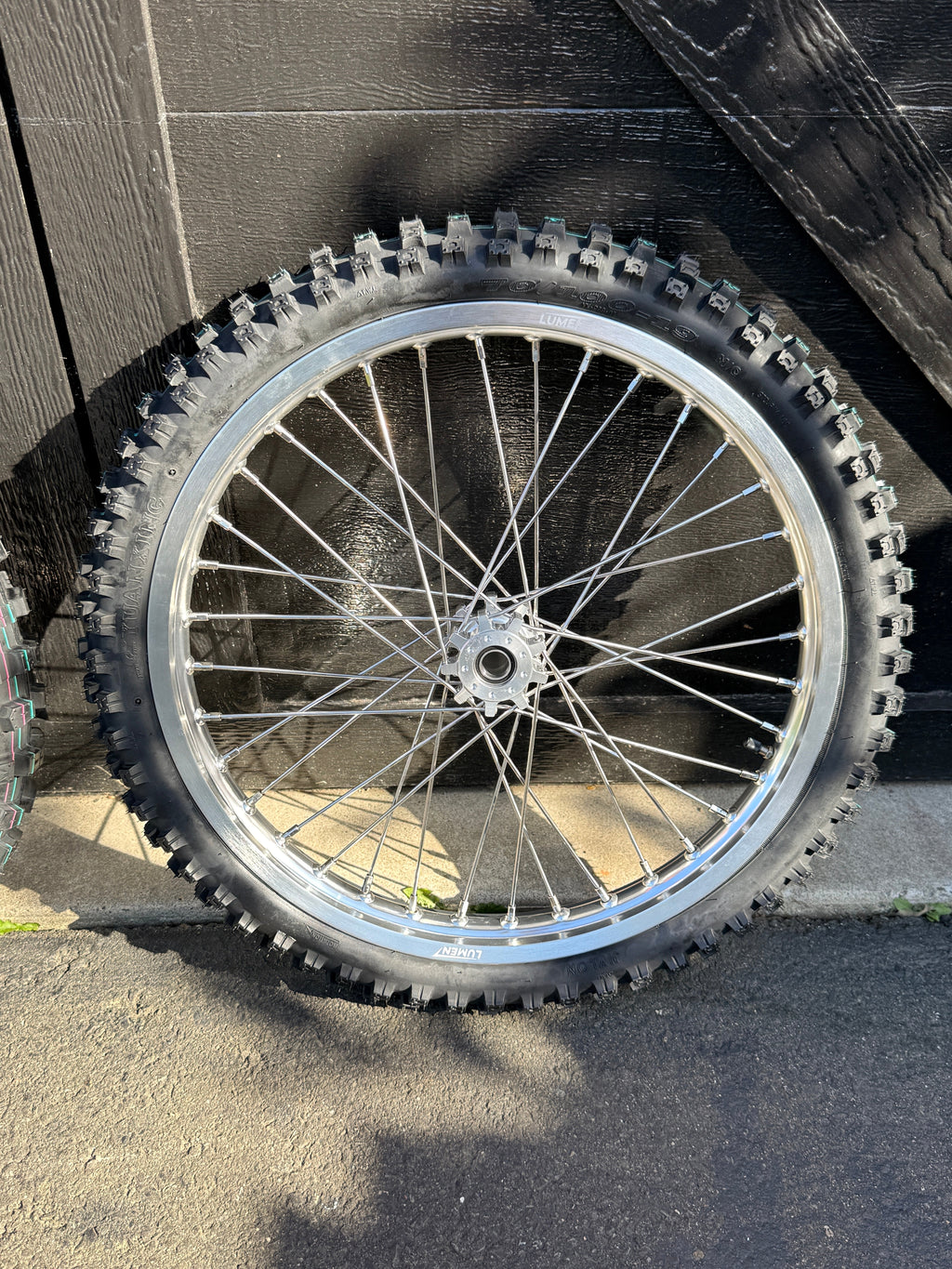 Lumen Racing 16/19 Light Bee/Eride Pro wheelset with preinstalled dirt tires, showcasing lightweight racing bike wheels.