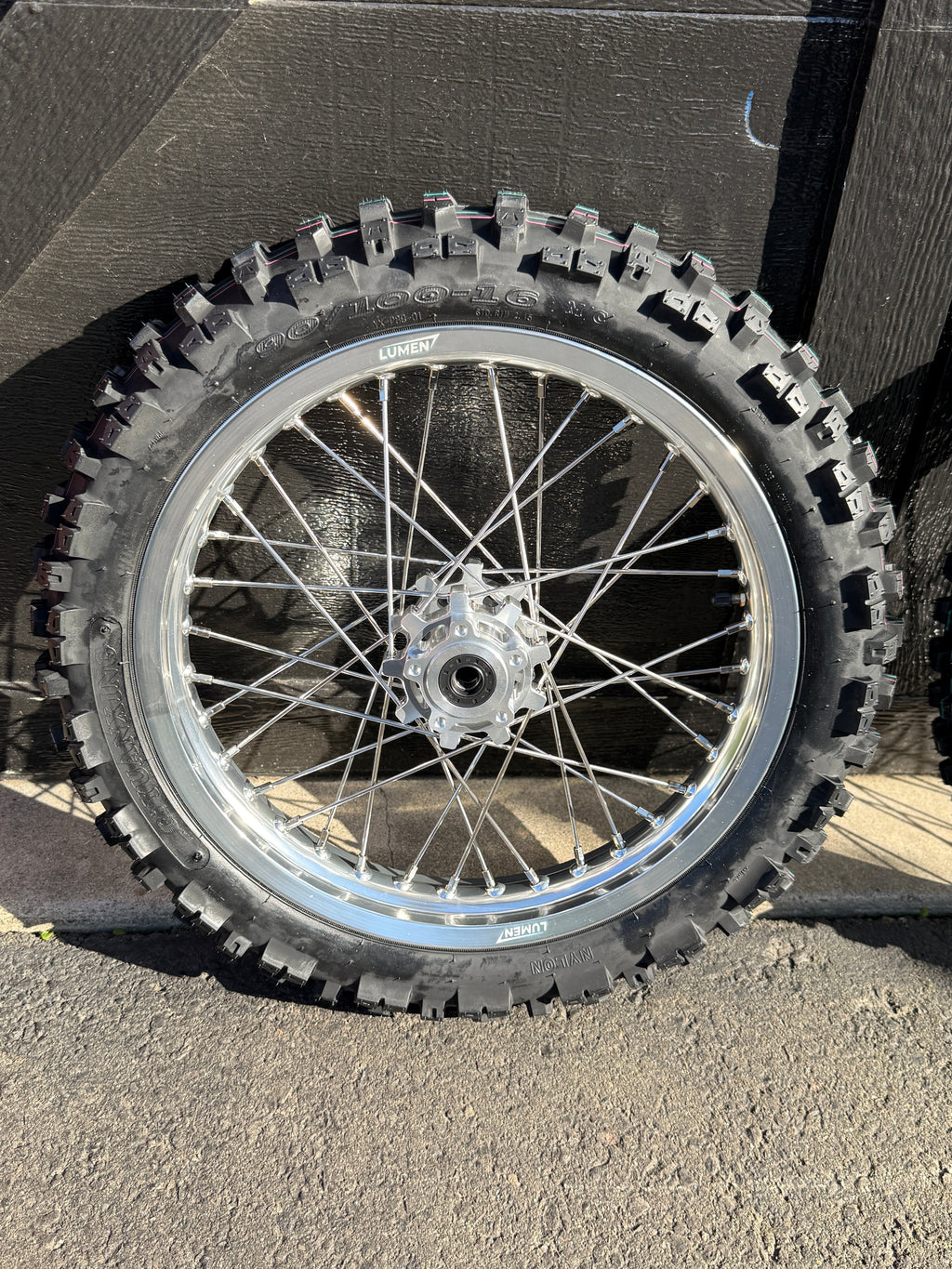 Lumen Racing 16/19 Light Bee/Eride Pro wheelset with preinstalled dirt tires, showcasing lightweight alloy rims for mountain biking.