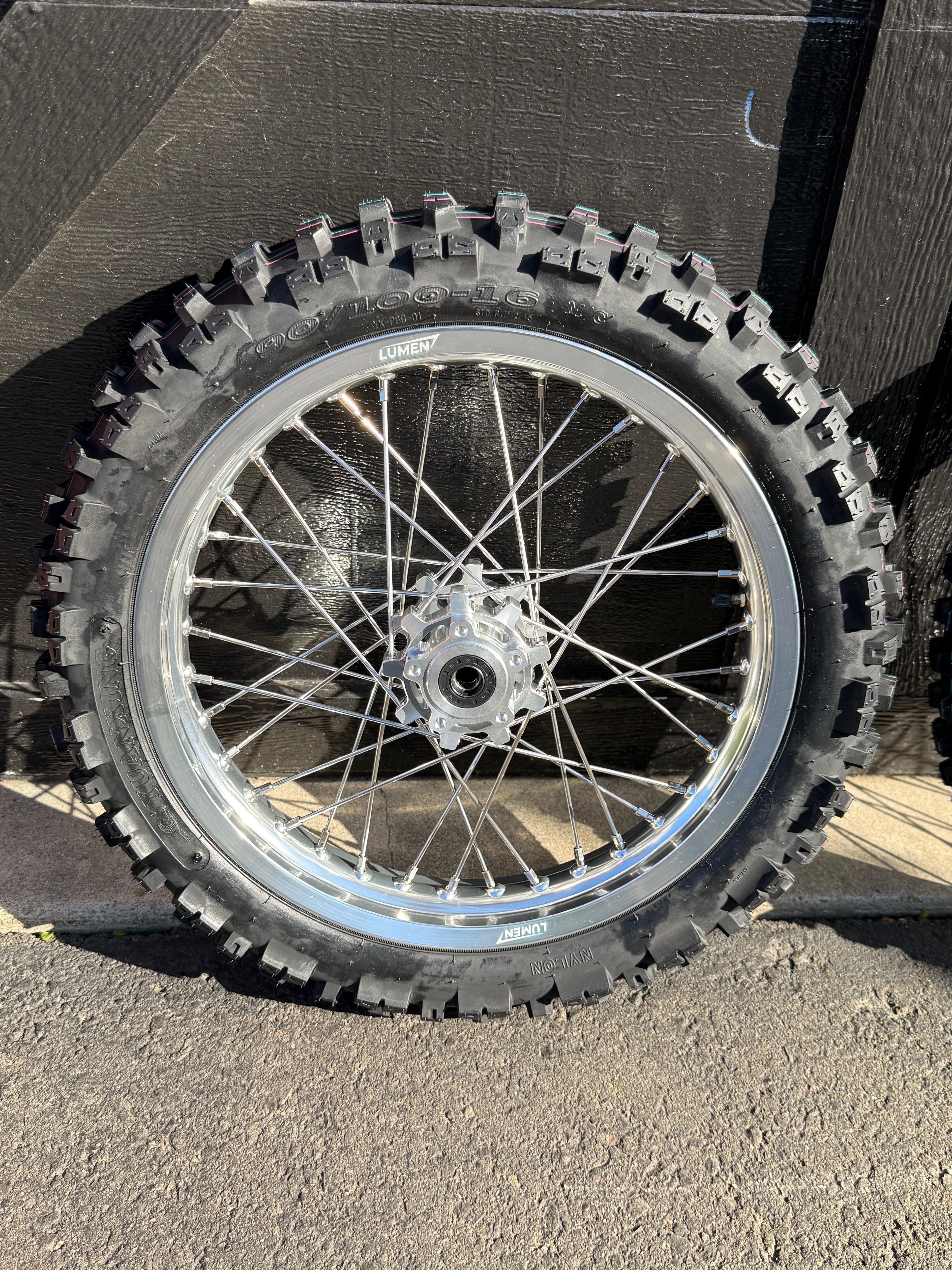 Lumen Racing 16/19 Light Bee/Eride Pro wheelset with preinstalled dirt tires, showcasing lightweight alloy rims for mountain biking.