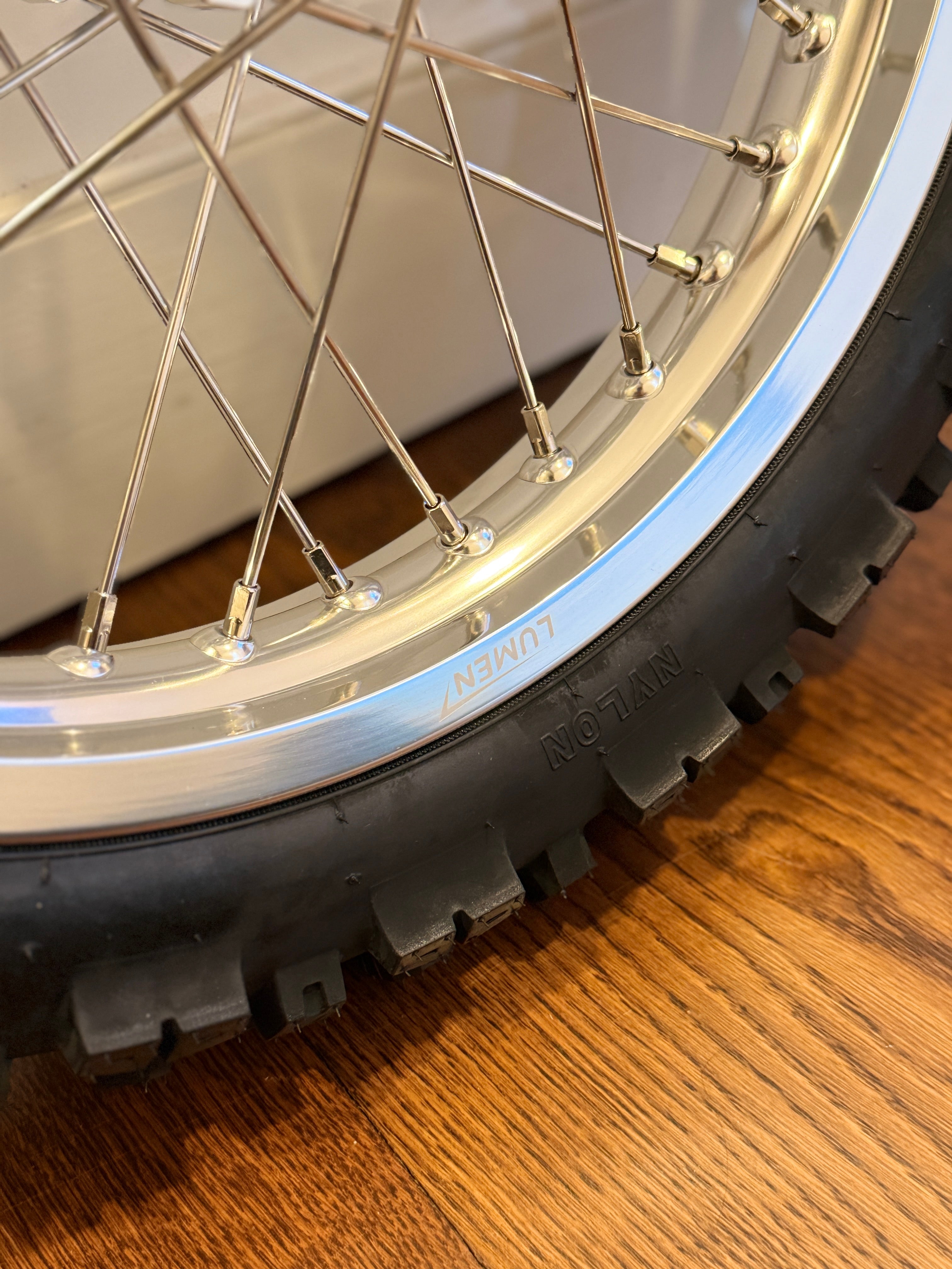 Lumen Racing 16/19 Light Bee/Eride Pro Wheelset with preinstalled dirt tires, showcasing lightweight racing bike wheels.