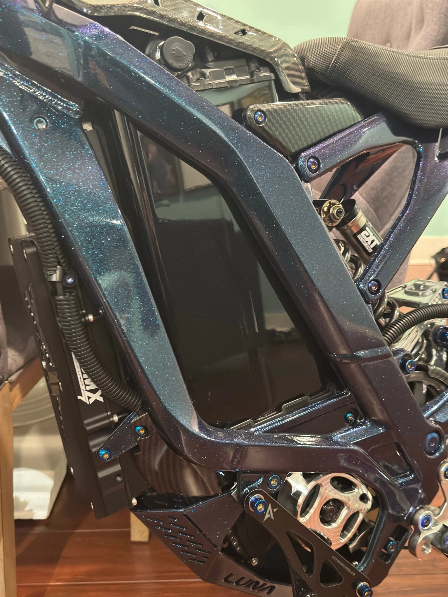 Black Vantablack battery vinyl wrap for e-bike from MXwraps, showcasing a sleek, matte finish on a bicycle battery.