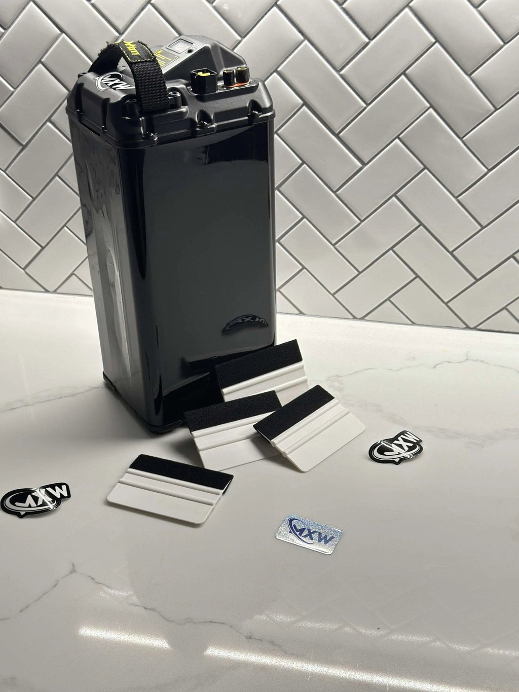 MXwraps microfiber squeegee accessory for cleaning and detailing, with a flexible rubber blade and ergonomic handle.
