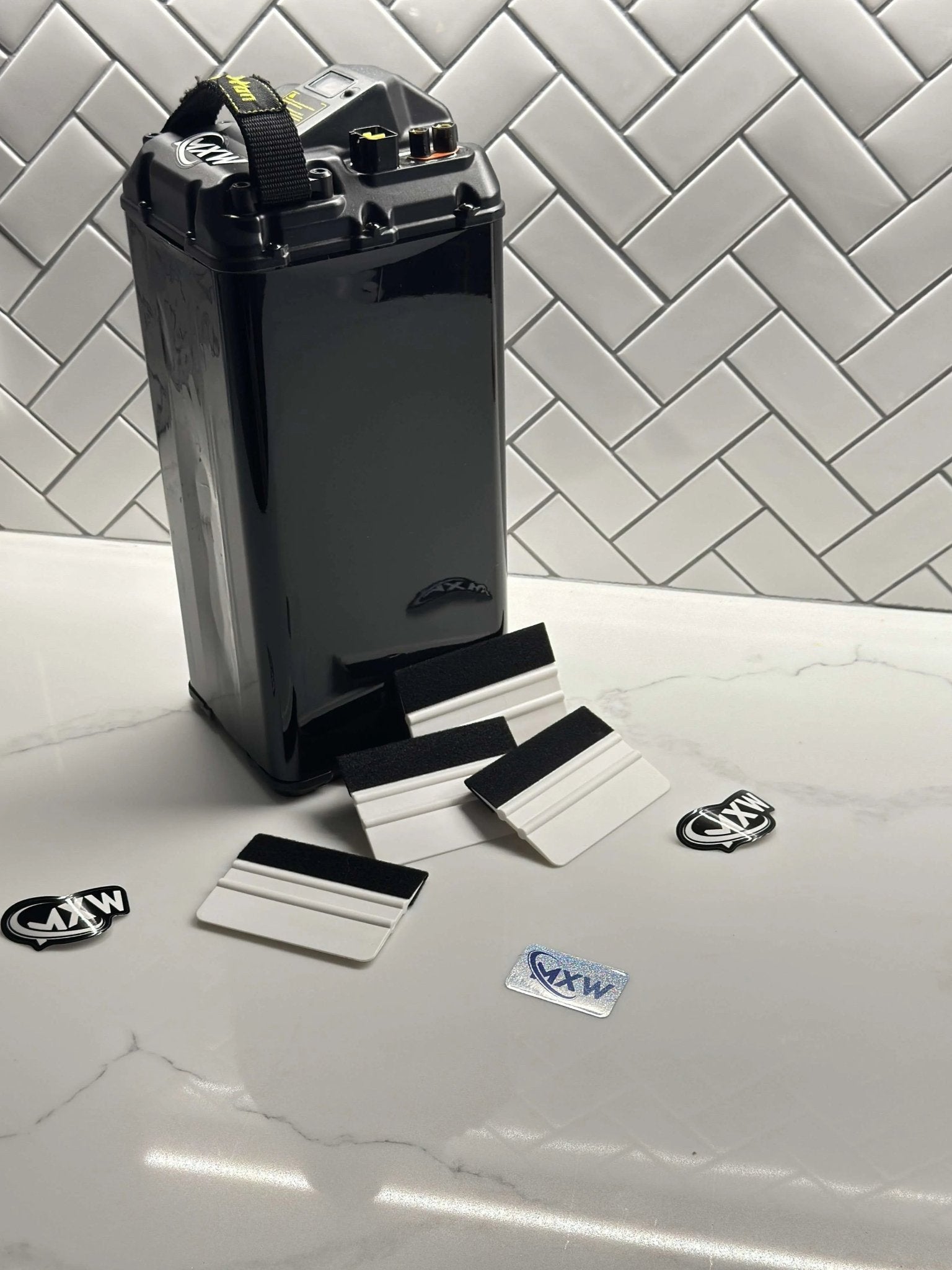 MXwraps microfiber squeegee accessory for cleaning and detailing, with a flexible rubber blade and ergonomic handle.
