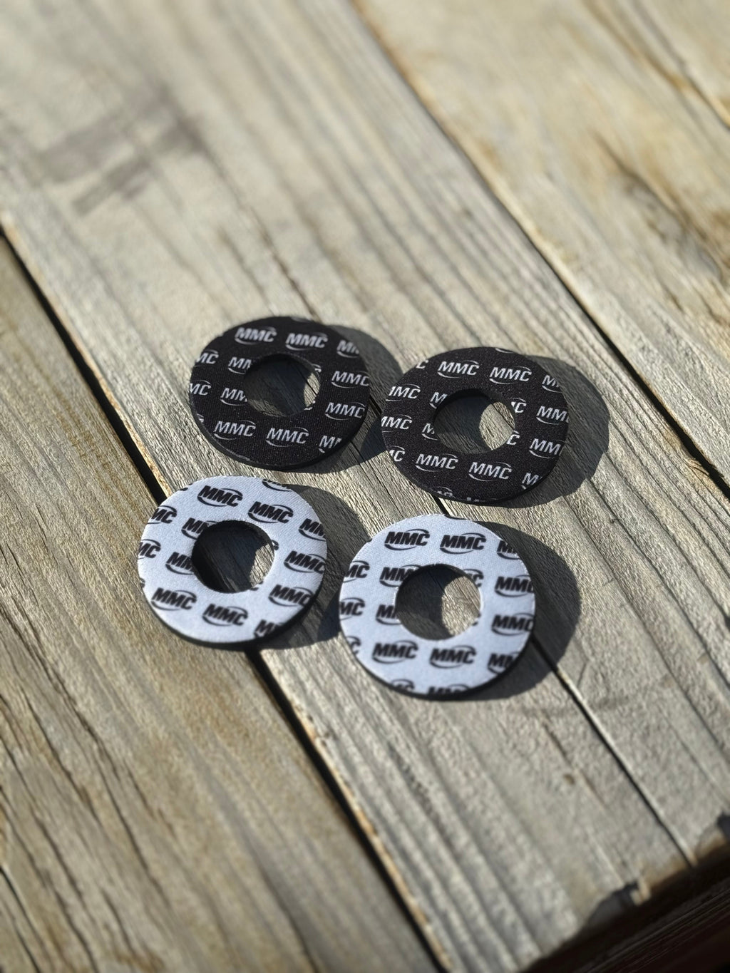 Modded Moto Co MMC Grip Donuts accessory with textured rubber surface, designed for motorcycle handlebar grips.
