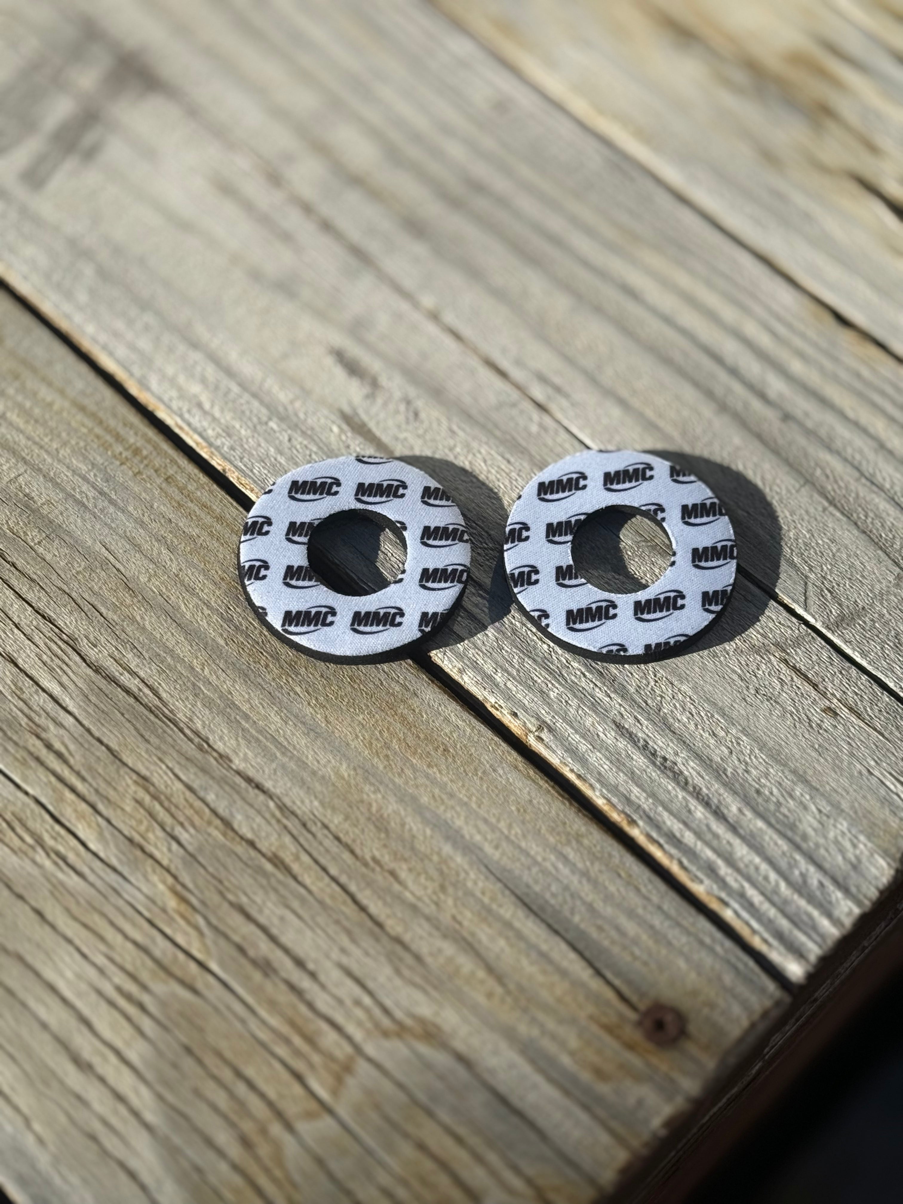Modded Moto Co MMC Grip Donuts accessory with black rubber grips and silver accents, designed for motorcycle handlebar protection.