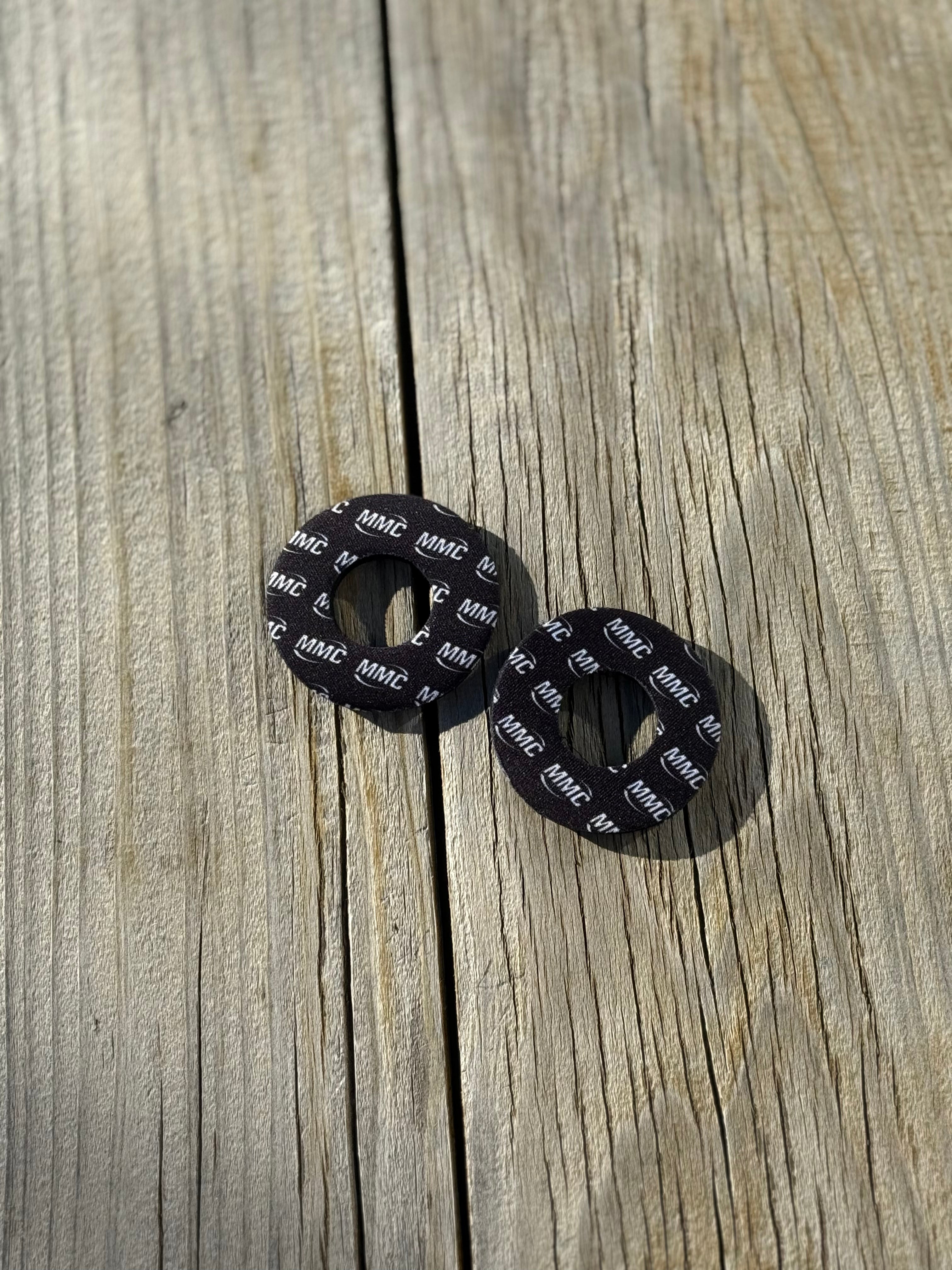 Modded Moto Co MMC Grip Donuts accessory with textured rubber surface and vibrant colors for motorcycle handlebar grip enhancement.