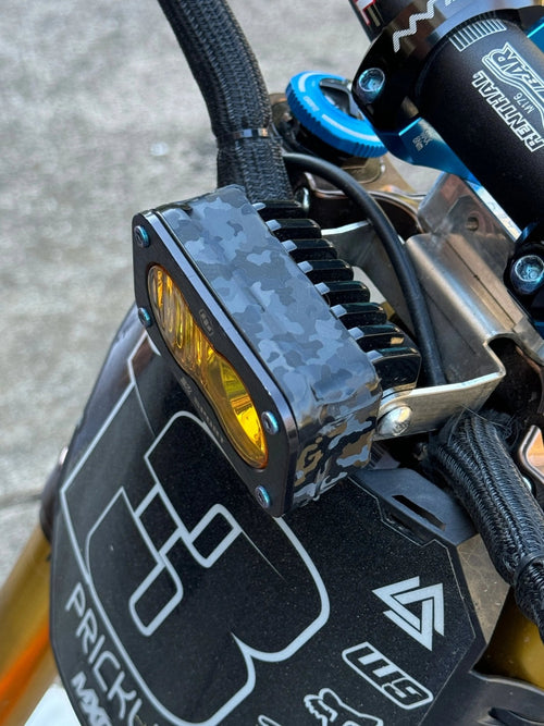 ShadowSlate Baja Style vinyl headlight wrap by MXwraps, showing a close-up of the inverted corner detail.