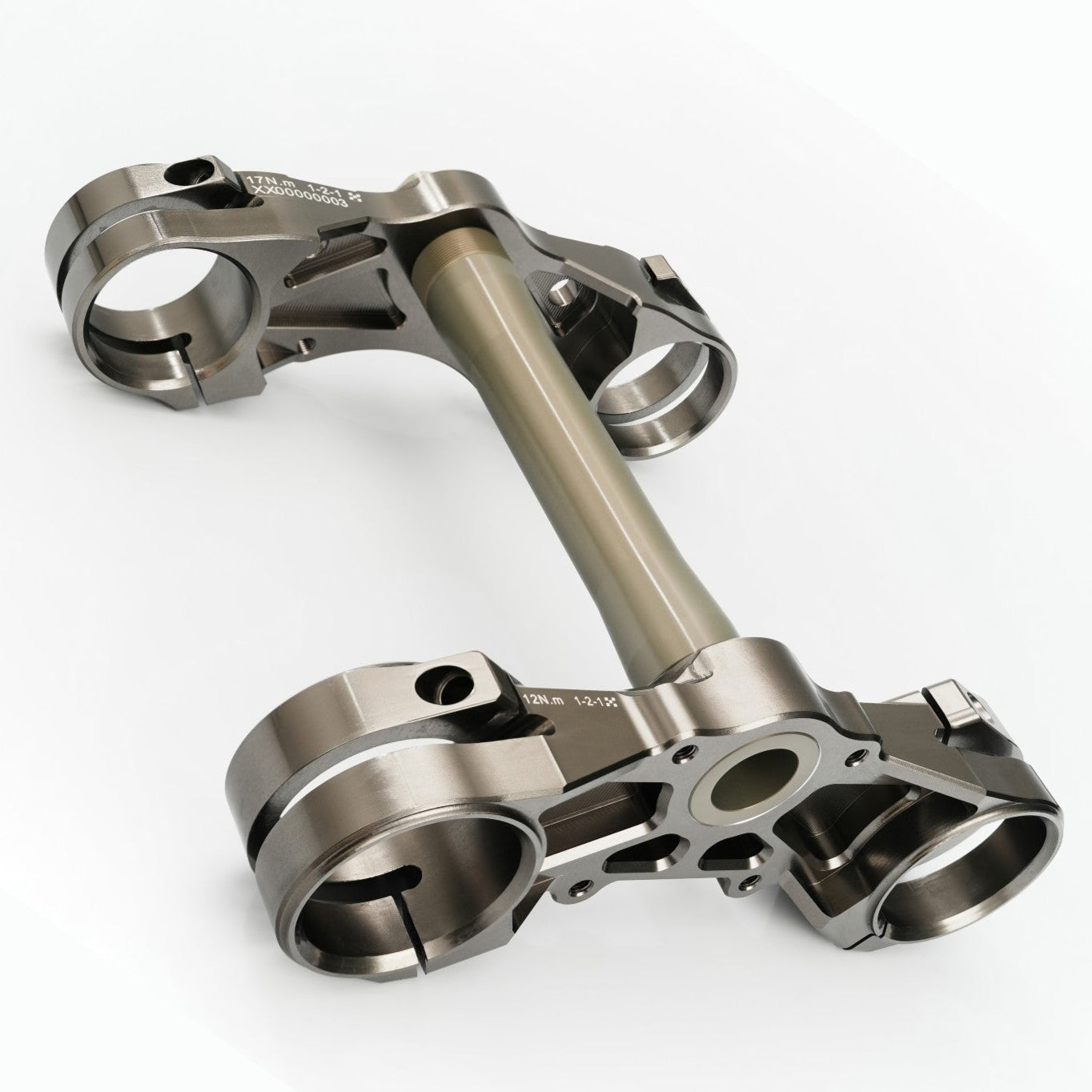 Modded Moto Co Pure Racing Surron Ultra Talaria Komodo suspension forks with TRAXION Crown component, shown in close-up view