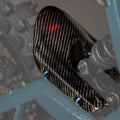 Modded Moto Co E-Ride Pro carbon fiber mud guard for electric bikes, showcasing sleek, lightweight body protection design.