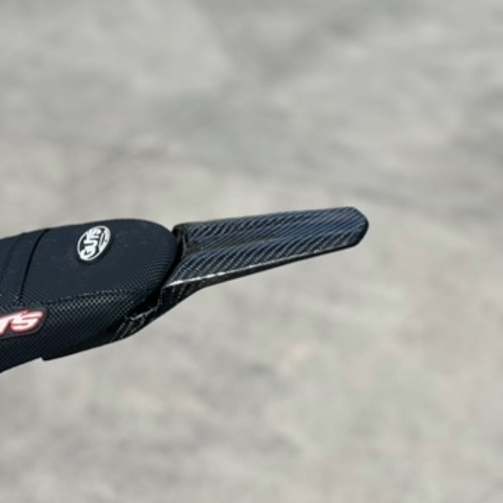 Modded Moto Co E-Ride Pro carbon fiber rear fender for motorcycle, showcasing sleek, lightweight body protection.