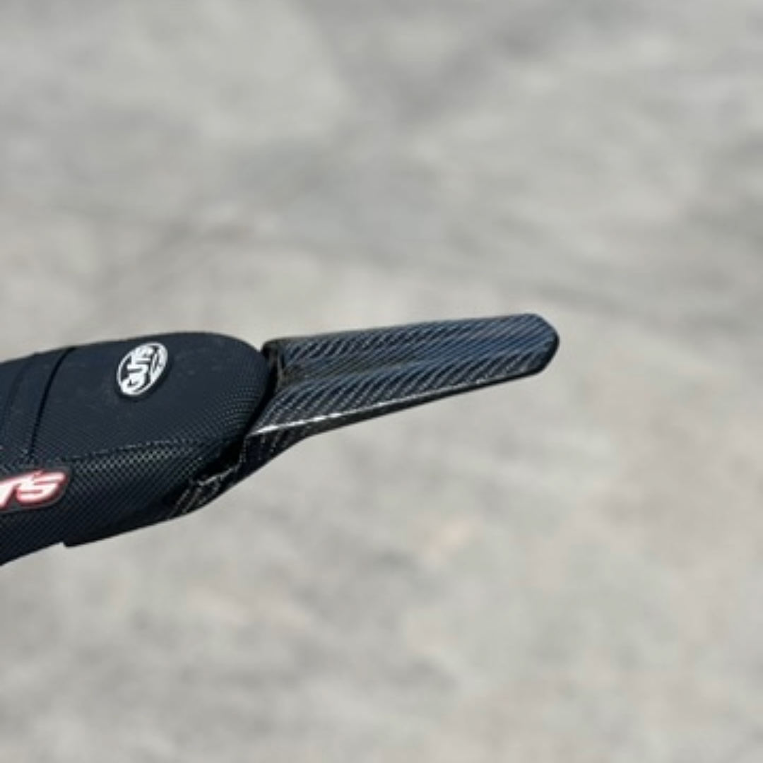Modded Moto Co E-Ride Pro carbon fiber rear fender for motorcycle, showcasing sleek, lightweight body protection.