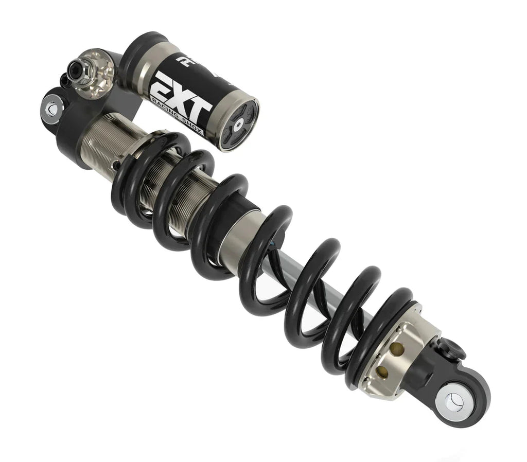 Modded Moto Co EXT Arma MX rear shock absorber for Surron and Talaria electric bikes, showcasing the shock's durable design and components.