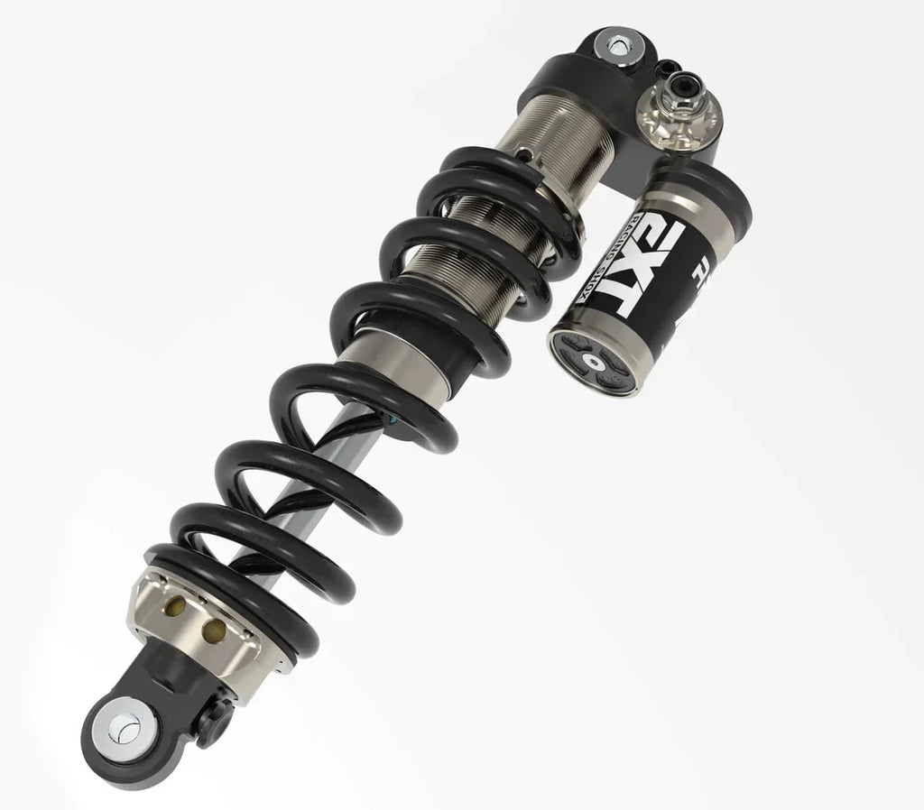 Modded Moto Co EXT Arma MX rear shock absorber for Surron and Talaria electric dirt bikes, showcasing the durable shock damper.