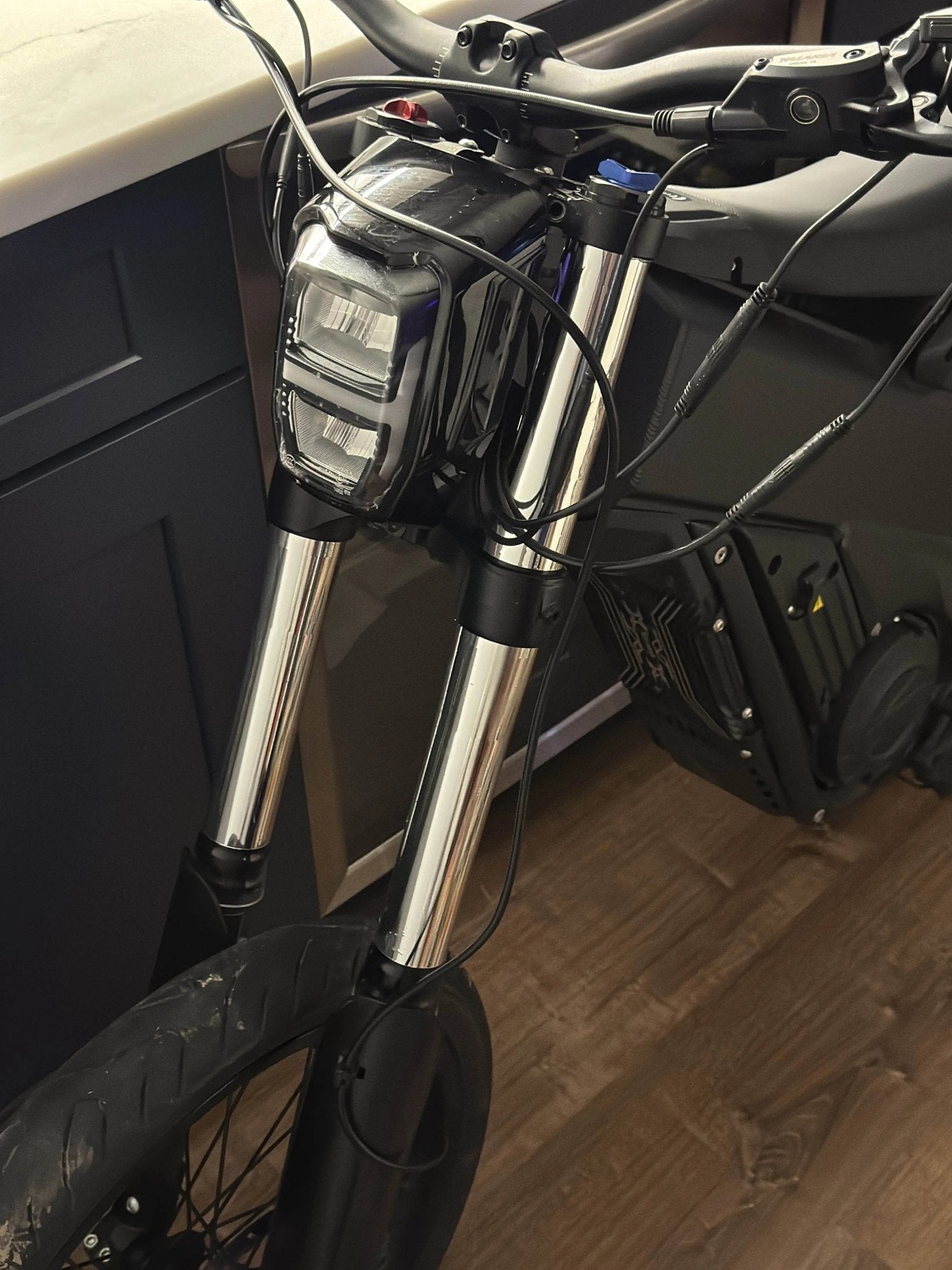 MXwraps E-bike fork vinyl wrap kit applied to front forks, showcasing a sleek, protective design on bicycle front suspension.