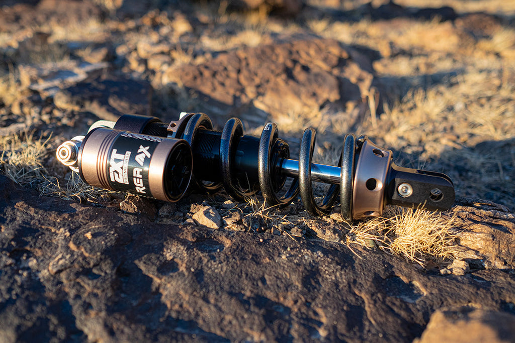 Modded Moto Co EXT REA MX Shock – Ultra Bee, a high-performance motorcycle shock absorber with a glow finish and durable construction.