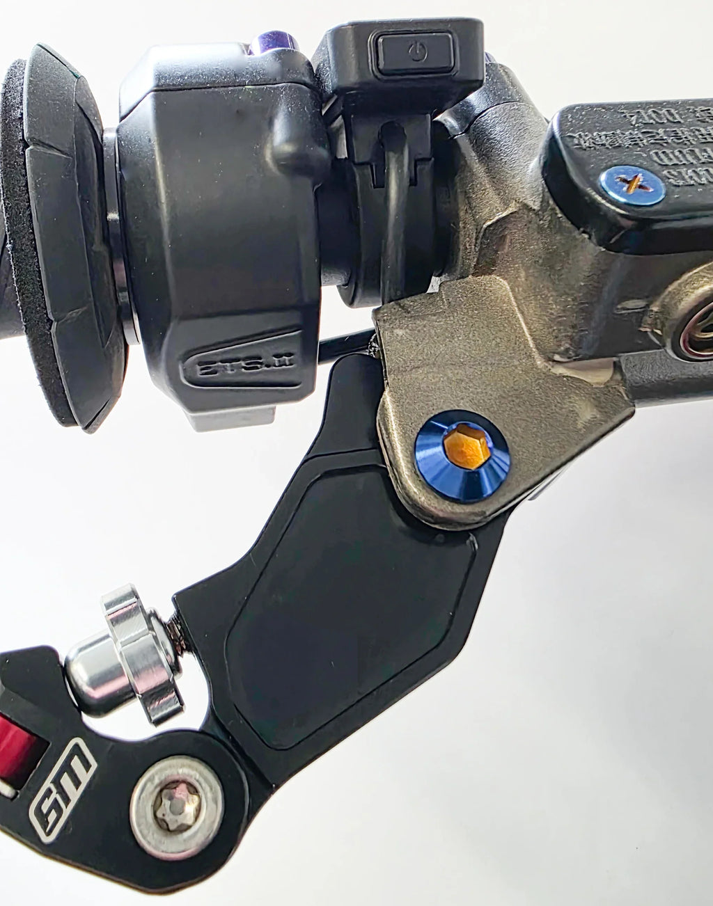 Titanium Warp 9 Shorty Style Ultra Bee Lever Pivot Bolts by Modded Moto Co, shown in a close-up image.