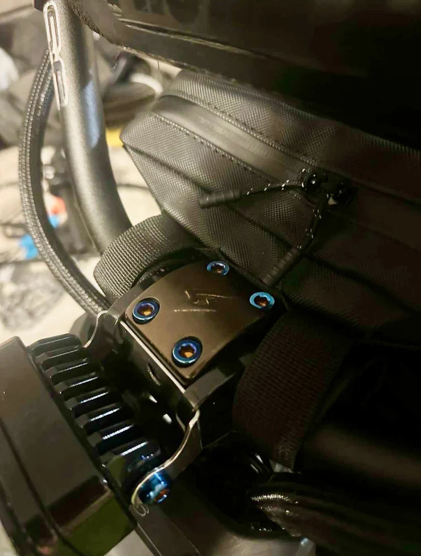 DevMoto Super 73 direct mount bolts for electric bike frame installation, showing close-up of metal bolts with threading.
