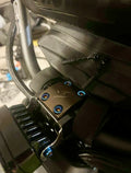 DevMoto Super 73 direct mount bolts for electric bike frame installation, showing close-up of metal bolts with threading.