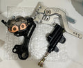 Emoto Flux Ultrasilverback Surron Light Bee/Eride pro moto foot brake kit installed on the motorcycle.